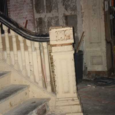The staircase on the first floor having work done.