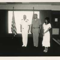 3 Unknown people at a ceremony