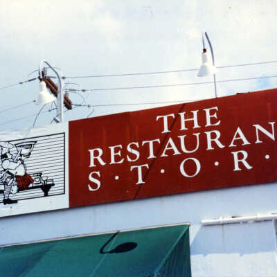 The Restaurant Store Sign