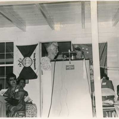 An unknown group of people at a meeting