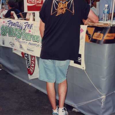 Spirits from the Triangle Fantasy Fest street fair sign.