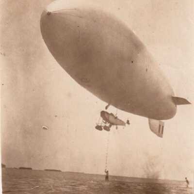 Blimp with Man on Ladder Over Water: Copyright: © Key West Art & Historical Society; Origformat: Print-Photographic