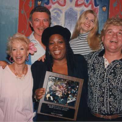 Unknown group of people with a plaque.