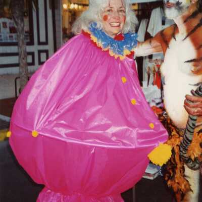 Two unknown people dressed up.