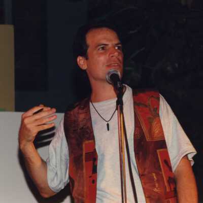 Unknown man talking at the Coors light parade workshop.