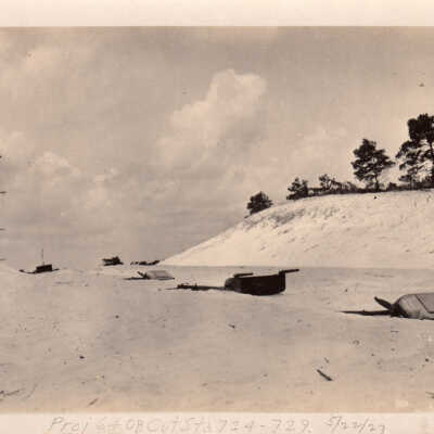 Sand dune and telephone poles