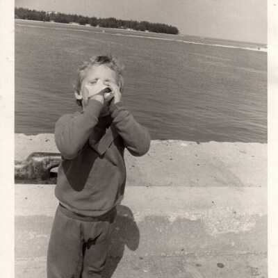 Young boy with conch shell: Copyright: © Key West Art & Historical Society; Origformat: Print-Photographic