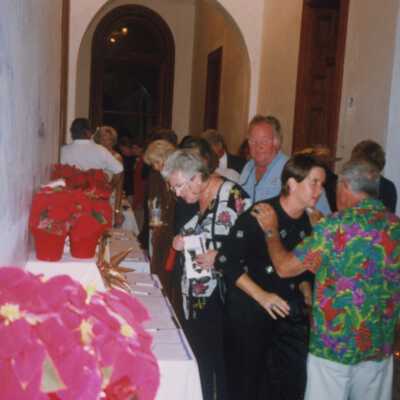 A group of unknown people standing inside.