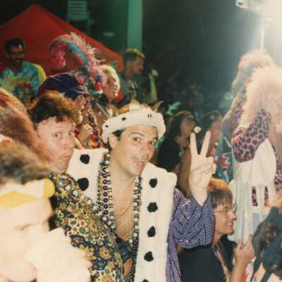 A group of unknown people dressed up.
