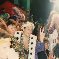 A group of unknown people dressed up.