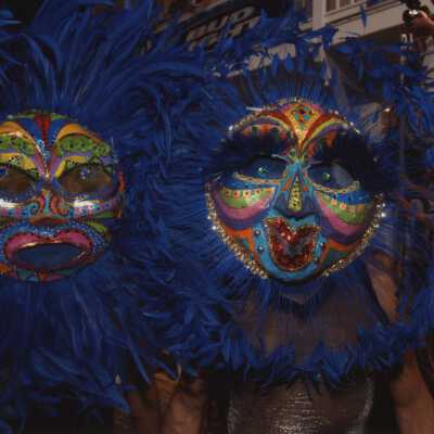 Two unknown people dressed up.