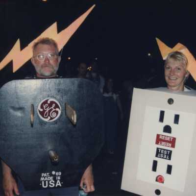 Unknown couple dressed up as a socket and electric cord.