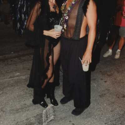 Unknown couple dressed up.