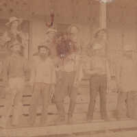 Group of men on steps