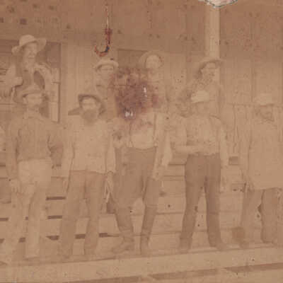Group of men on steps