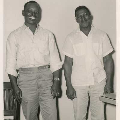 Unknown men posing for a photograph
