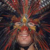 An unknown man wearing a face mask.