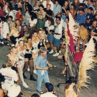 Unknown people walking in the parade.