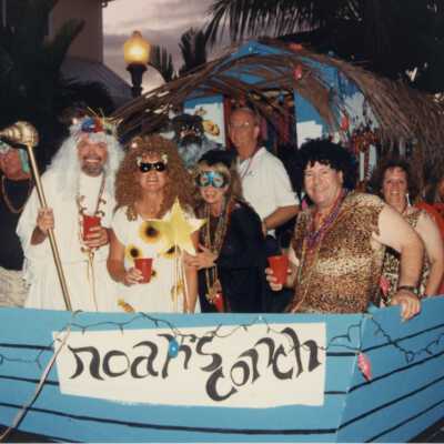Unknown people dressed up in a float.