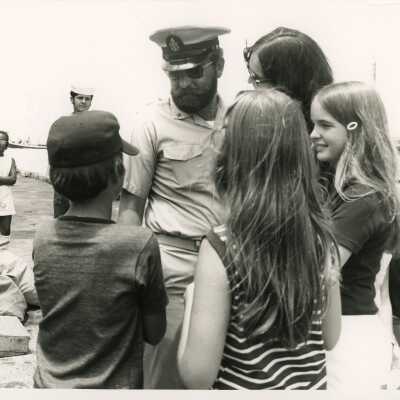 A group of unknown men sitting at a table