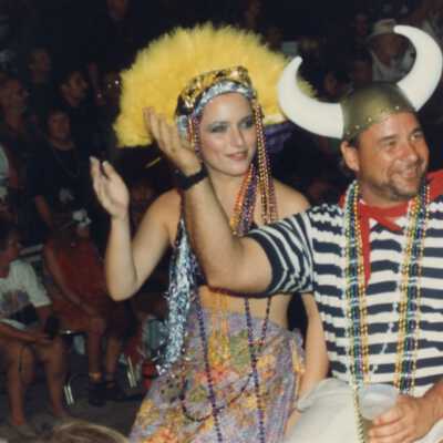 Unknown people dressed up on a float.