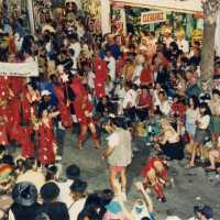 A group of people in the street during the parade.