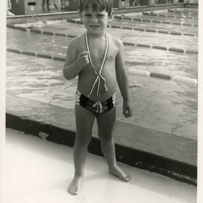 An unknown kid at a pool