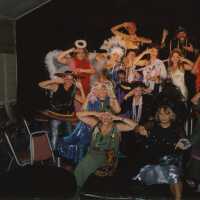 A group of unknown people dressed up.