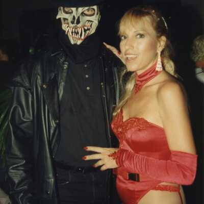 Unknown man and woman dressed up.