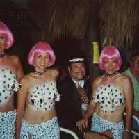 Four unknown people dressed up.