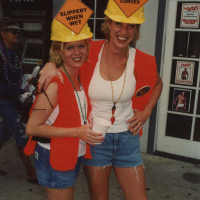 Two unknown woman dressed up.