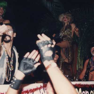 Unknown people dressed up on a float.