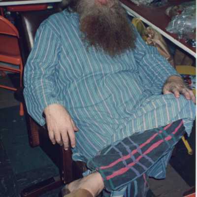 Unknown man sitting in a chair.