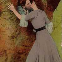          Man and woman kissing
   