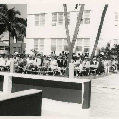A group of people sitting at a ceremony
