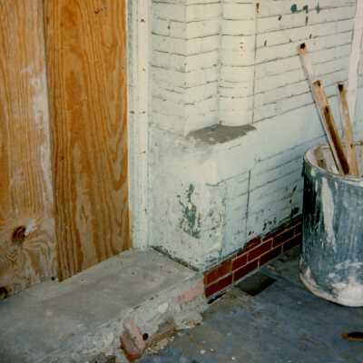 The porch and brick work on the porch.