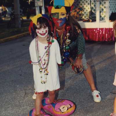 Two unknown people dressed up.
