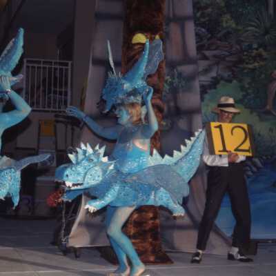 A few unknown people dressed up.