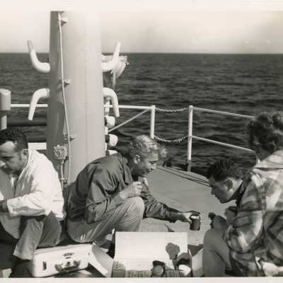 U.S. Navy ship with unknown people eating