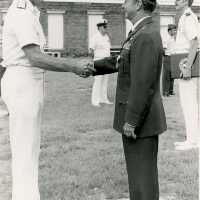 2 Men in uniform shaking hands