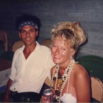 Unknown couple sitting.