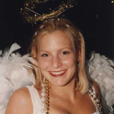 Unknown woman dressed up as an angel.