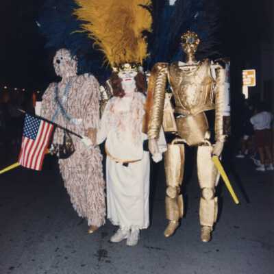 Unknown people dressed up in the parade.