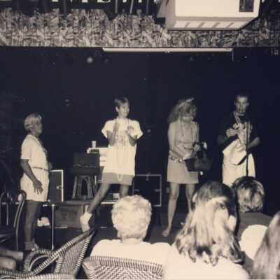 Unknown people on a stage.