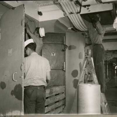 U.S. Navy working on a ship