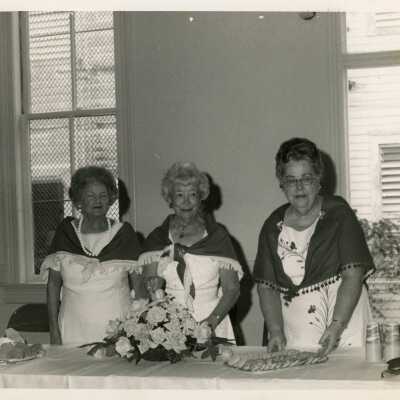3 Unknown woman at a party