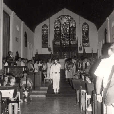 Band and crowd in a church