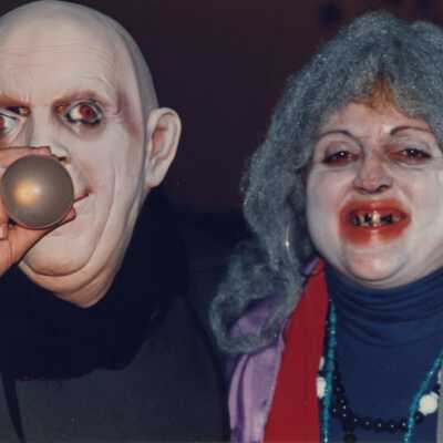 Unknown couple dressed up.