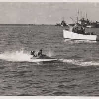         Man in a speedboat picture number 1
   