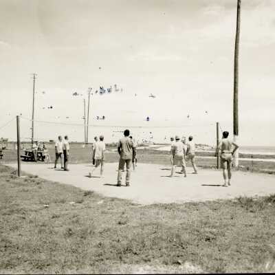 Unknown men playing volleyball